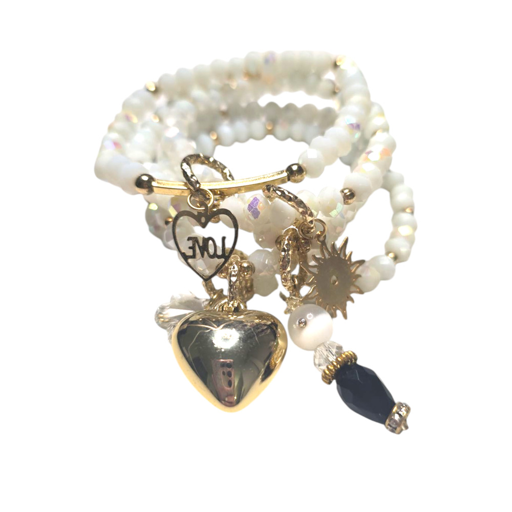 Rubylishious 
Handmade white and gold bead bracelet 
5 piece set 
Small no stret